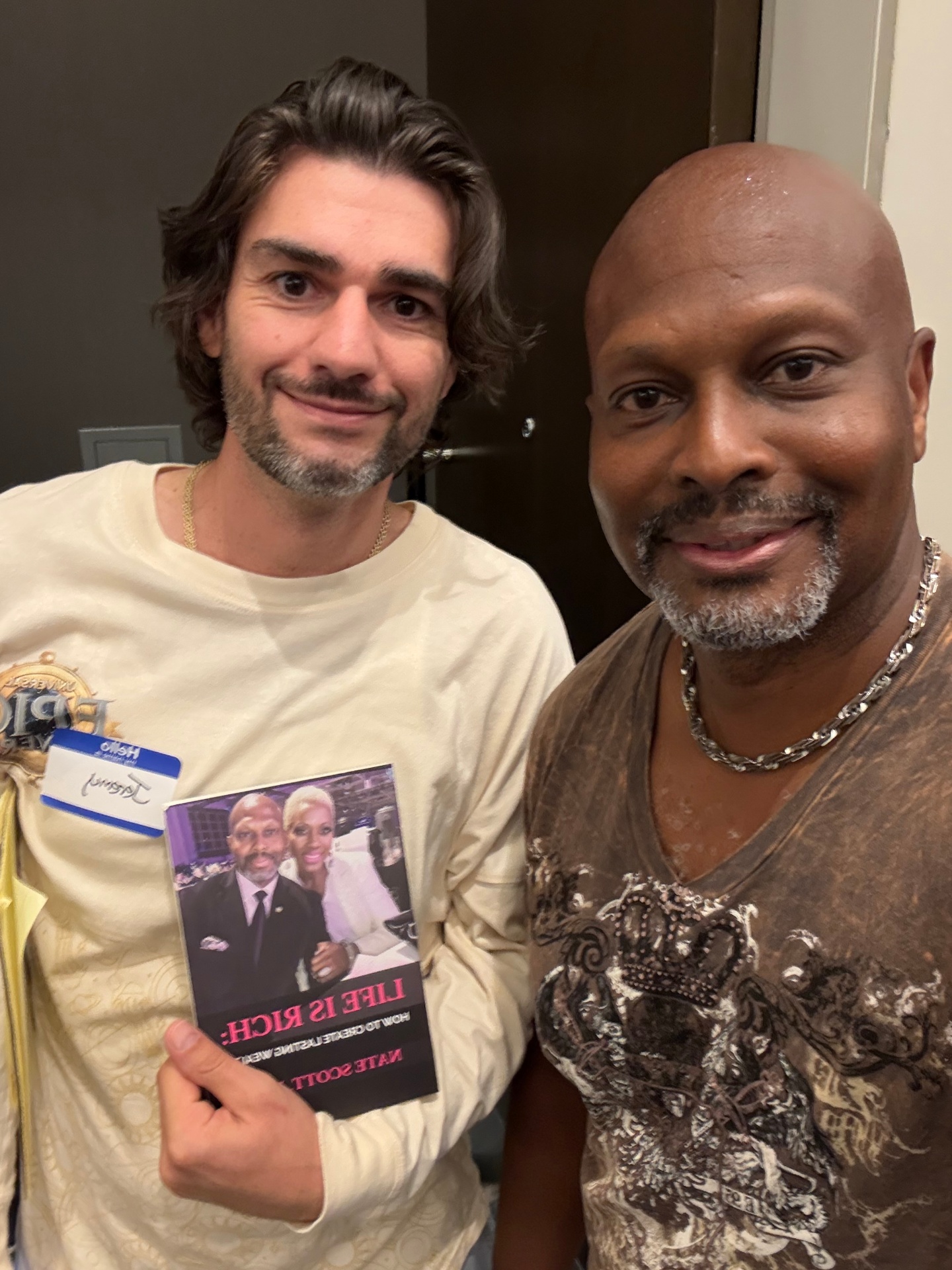 Reader with Nate Scott holding Life Is Rich